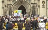 Rally outside the High Court in London, U.K, Feb. 20, 2024.