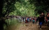 Migrants crossing the Darien jungle on the Colombian-Panamanian border, 2024.