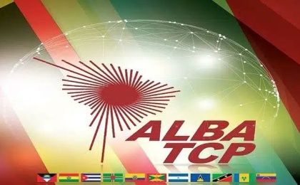 A poster with the flags of the ALBA-TCP countries.