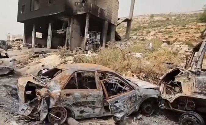 Houses and cars burned by Israeli settlers, West Bank, April 2024.