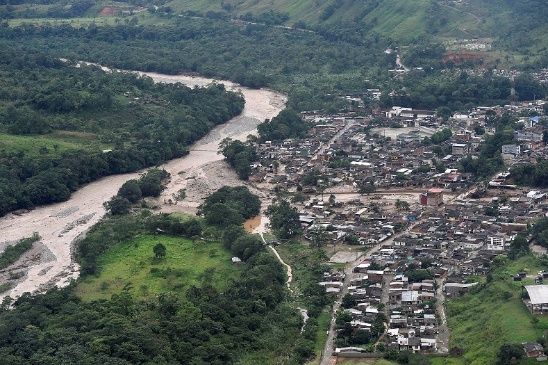 An aerial view shows a flooded area after heavy rains caused several rivers to overflow, pushing sediment and rocks into buildings and roads in Mocoa, Colombia April 1, 2017.