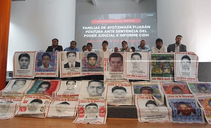 Relatives of the missing students during a press conference regarding a tribunal's decision to create an independent investigation commission over the case. Mexico City, June 7, 2018.