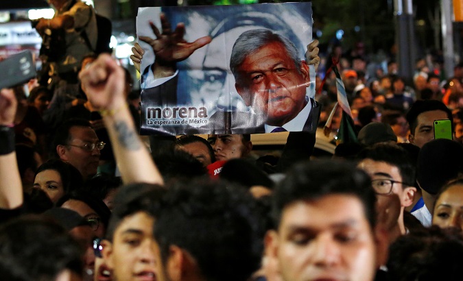 Supporters of presidential candidate Andres Manuel Lopez Obrador react after polls closed in the presidential election, in Mexico City, Mexico July 1, 2018.