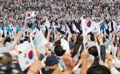 Surcoreanos mientras vitoreaban este miércoles durante la celebración del 73° aniversario del Día de la Liberación Nacional del dominio colonial japonés.
