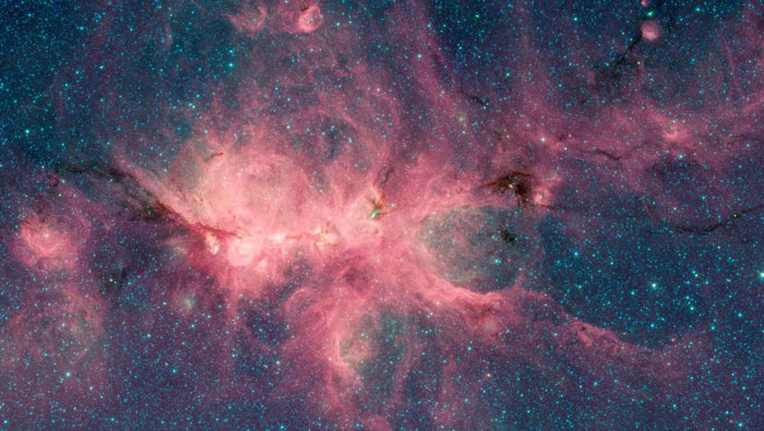 La nebulosa donde se formaron las burbujas espaciales se encuentra a una distancia de entre unos 4.200 y 5.500 años luz de la Tierra.