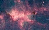 La nebulosa donde se formaron las burbujas espaciales se encuentra a una distancia de entre unos 4.200 y 5.500 años luz de la Tierra.