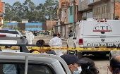 Las autoridades policiales realizan las investigaciones para dar con los asesinos y autores de la masacre en el barrio de la localidad de Soacha.