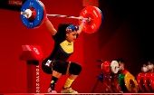 La ecuatoriana Neisi Dajomes, oro en los 76 kg de la halterofilia en Tokio, es la primera mujer reina olímpica de ese país.