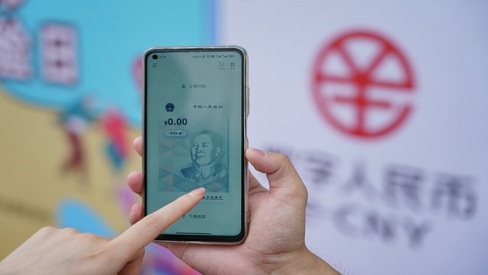 Según expertos, el empleo del yuan digital contribuirá al crecimiento de China y a solucionar problemas financieros.