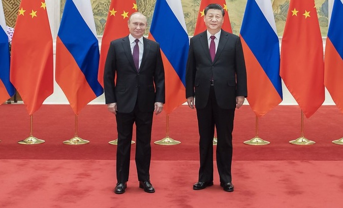 President Vladimir Putin (L) and President Xi Jinping (R), Diaoyutai State Guesthouse, Beijing, China, Feb. 4, 2022.